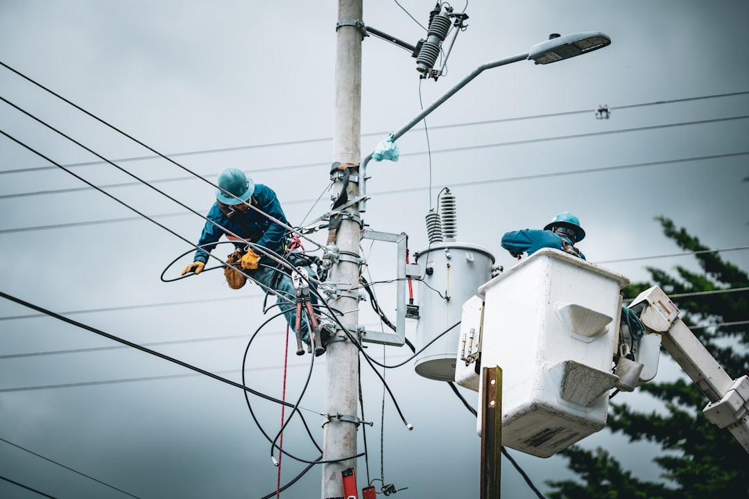 Engineers reviewing electrical plans